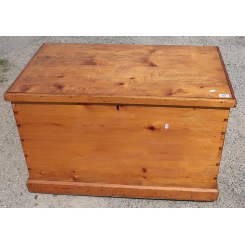 294 - Late Victorian pine blanket box with hinged top, twin carrying handles and internal candle tray (91c... 