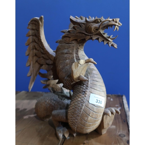 330 - Carved wood figure of a dragon (height 30cm) (A/F)