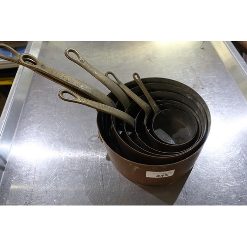 345 - Set of six graduating copper pans