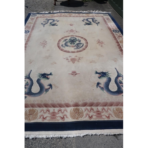 382 - Extremely large Chinese woollen blue and beige ground dragon pattern rug (270cm x 380cm)