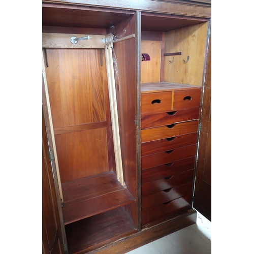 387 - Early 20th C oak two door combination wardrobe with fitted interior (141cm x 68cm x 206cm)