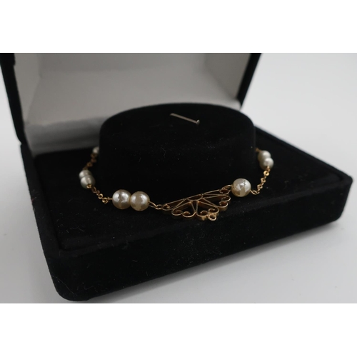 397 - 9ct gold and seed pearl necklace
