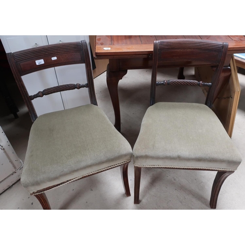 401 - Pair of 19th C mahogany saber leg dining chairs with upholstered seats and rope twist backs