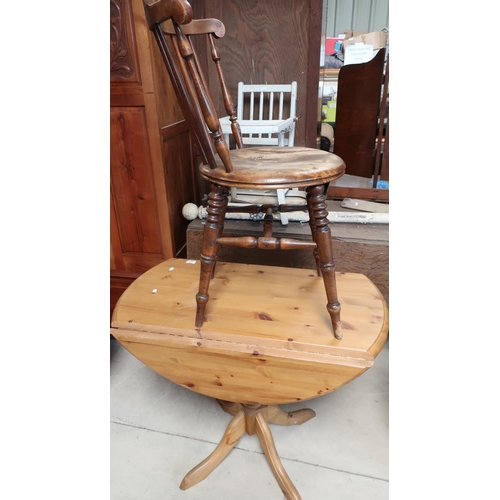 404 - Modern pine drop-leaf kitchen table and a stick-back chair on turned supports (2)
