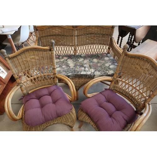 406 - Three piece bamboo and wicker conservatory suite comprising of two seat sofa and a pair of matching ... 