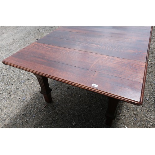 285 - 19th/20th C oak rectangular dining table on square fluted supports (224cm x 119cm)