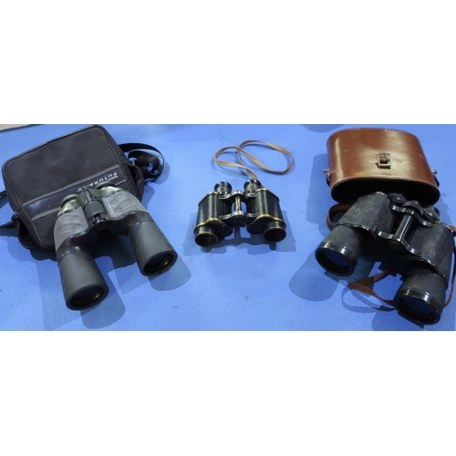 320 - Cased pair of military type binoculars by Taylor 1941,no. MKII and two other pairs of binoculars