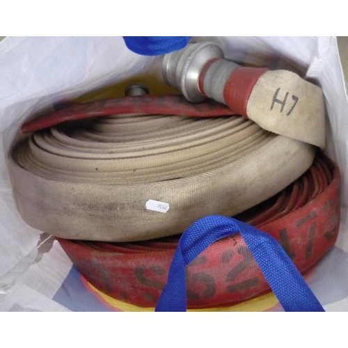 11 - Two large water hoses