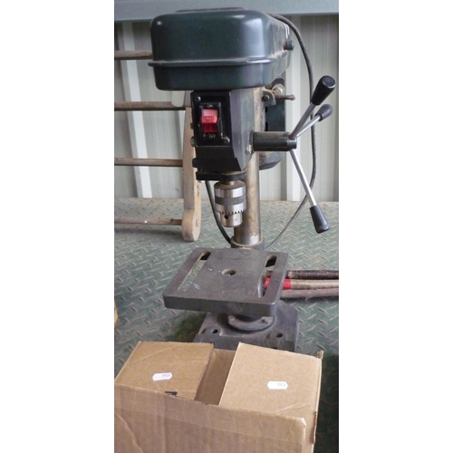 17 - Drill press by Naerok and a box of accessories and instruction manuals
