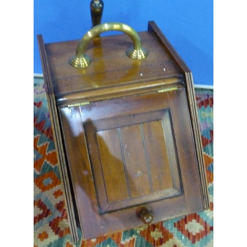 126 - Edwardian mahogany slope front coal box with brass handle and coal shovel and panelled detail to the... 
