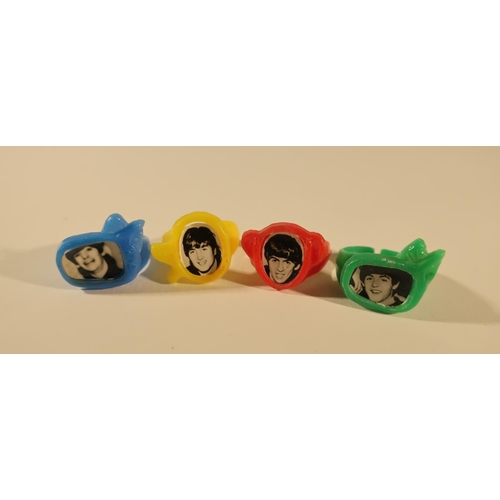 151 - Rare set of 1960's gumball type plastic rings featuring all four of The Beatles