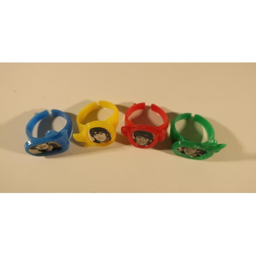 151 - Rare set of 1960's gumball type plastic rings featuring all four of The Beatles