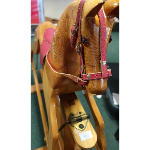 167 - Traditional carved wood pine rocking horse (height 81cm)