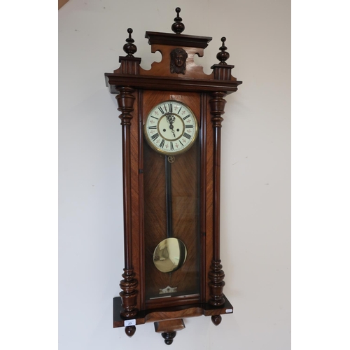 23 - Walnut cased double weighted Vienna style wall clock
