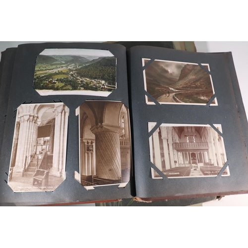 30 - Two postcard albums containing an extremely large quantity of various assorted postcards, mostly bla... 
