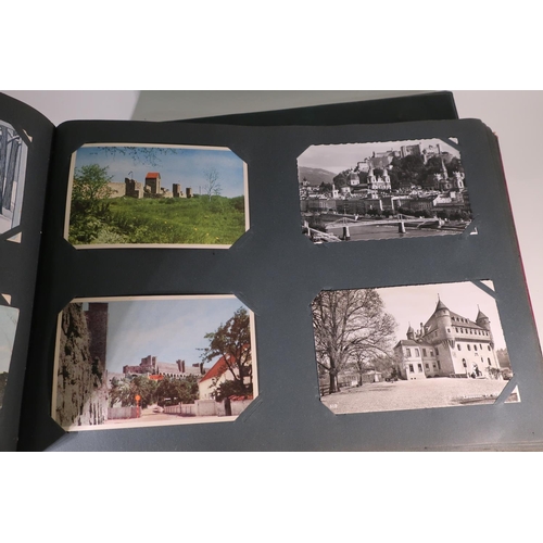 35 - A postcard album with internal date 1906 containing an extremely large quantity of various assorted ... 