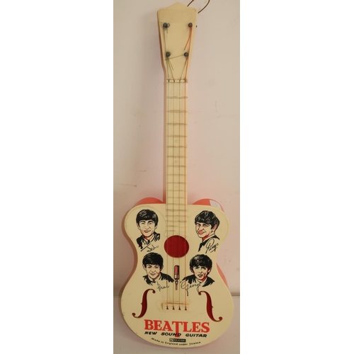 142a - Selco The Beatles New Sound toy guitar
