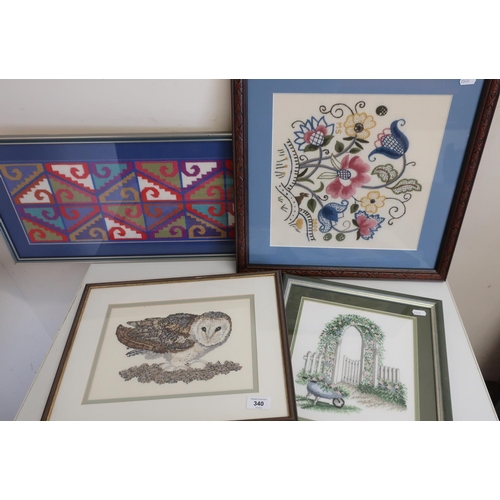 340 - Group of four embroidered and wool work pictures