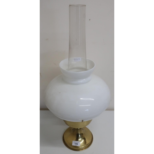 109 - 20th C brass paraffin lamp with opaque shade