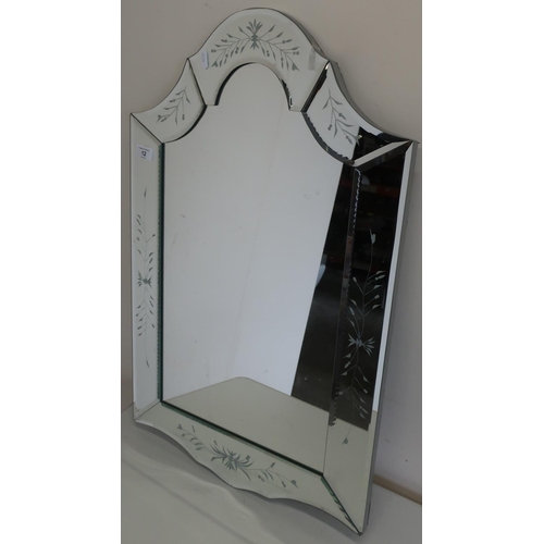 12 - Modern Venetian type wall mirror, the raised side panels with etched detail (51cm x 79cm)