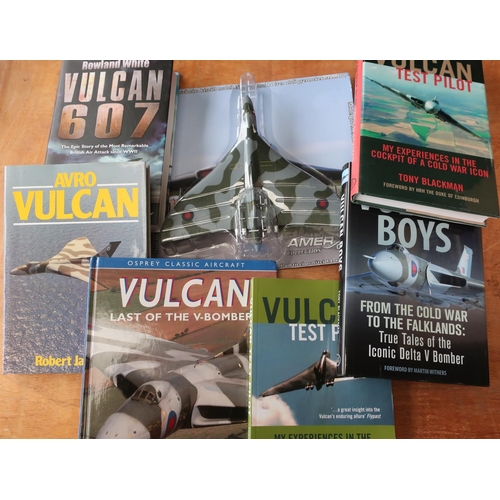 77 - Ephemera relating to the Vulcan Bomber including collector's wooden jigsaw, inflatable toy, two scal... 
