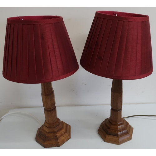 135 - Pair of Yorkshire oak Mouseman style table lamps with carved octagonal columns and stepped octagonal... 