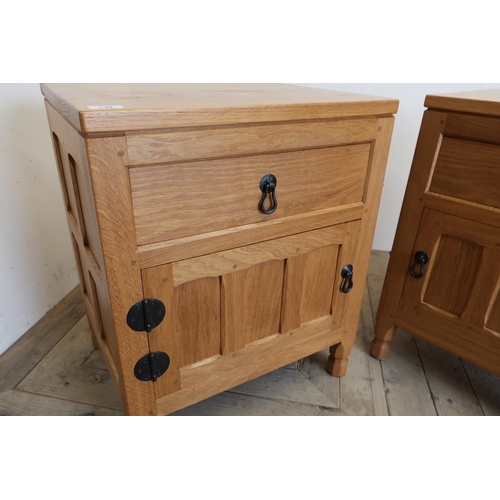 139 - Pair of Yorkshire oak craftsman made Mouseman style bedside cabinets with single drawer above panell... 