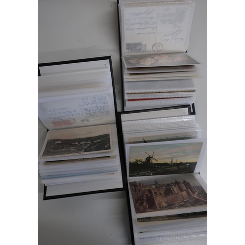 411 - Collection of various assorted postcards, in four small albums, mostly mid to late 20th C