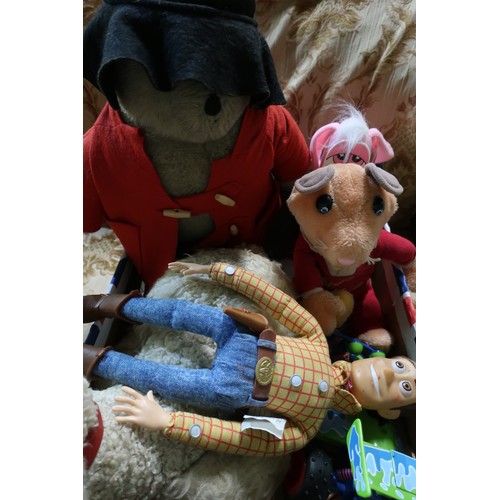 81 - Paddington Bear and various other soft toys including small selection of Lego, Toy Story figures inc... 