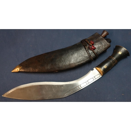 27 - Nepalese Gurkha Kukri with buffalo horn hilt and brass inserts and pommel cap, complete with leather... 