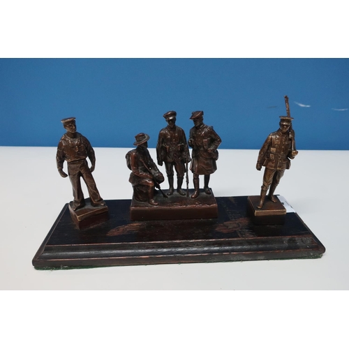 4 - Group of cast bronze British and Colonial c.WWI figures including central group of three flanked by ... 