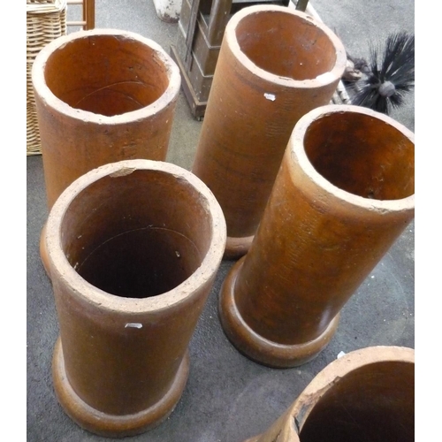 46 - Set of four ornamental drain pipes