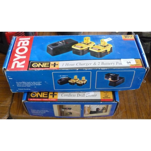 94 - Boxed Ryobi cordless drill and a boxed charger with battery