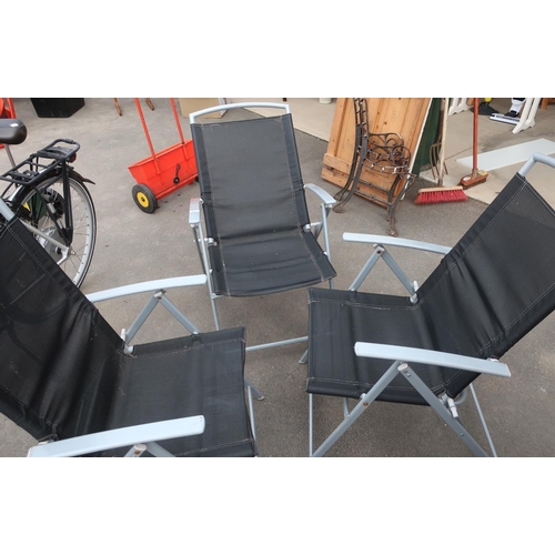 223 - Set of four folding garden chairs and a parasol