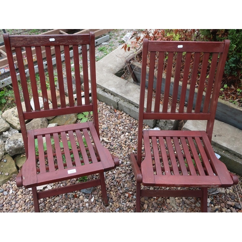 243 - Pair of folding wooden garden chairs