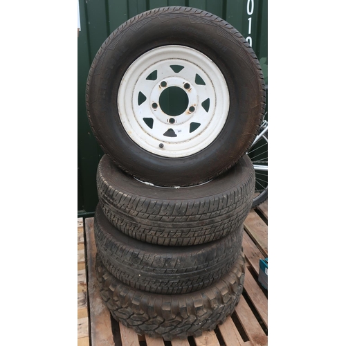 260 - Set of four Land Rover wheels, three with tyres