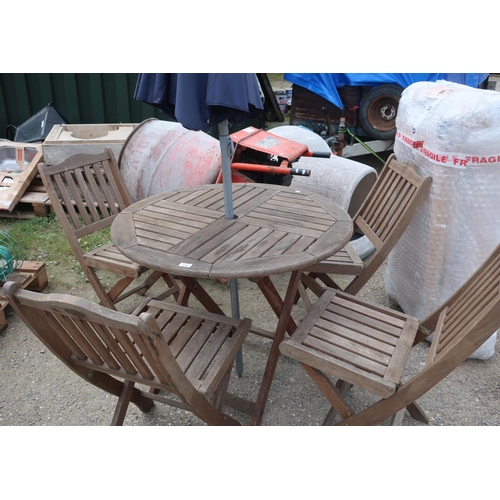 279 - Set of four wooden folding garden chairs with round table