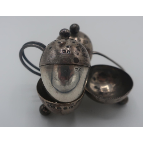 22 - Victorian hallmarked silver egg cruet, with spoon and loop handle, on ball feet, Birmingham 1899 by ... 
