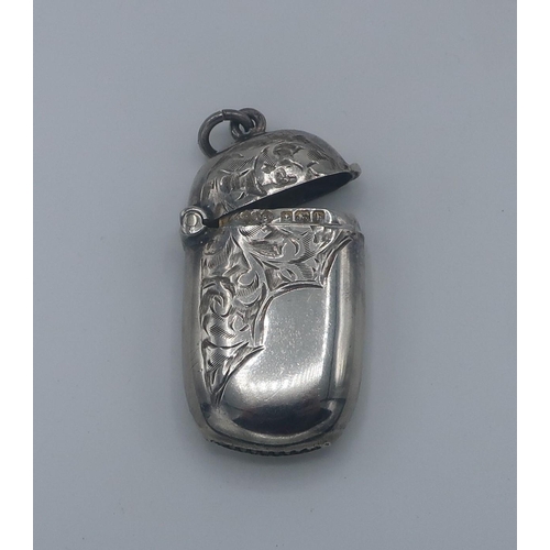 54 - Small Edwardian silver Vesta case, part engraved with scrolls, Birmingham 1907' by Smith & Bartlam,