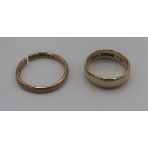 14 - Two 9ct hallmarked gold wedding bands, one cut, 6.5g
