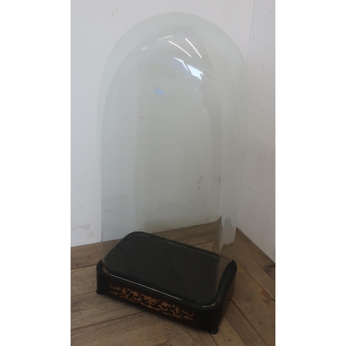 24 - Extremely large rectangular form glass dome, on ebonised and inlaid base with ball feet (66cm x 20cm... 