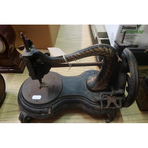 33 - Vintage sewing machine, possibly Smith & Sons, shaped base with scroll feet and gilt detail (length ... 