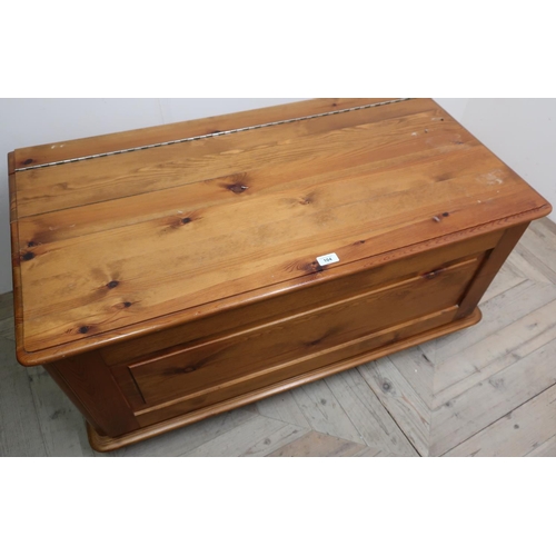 104 - The Cabinet Workshop Warwick, pine rectangular blanket box with hinged lid, on turned feet (105cm x ... 