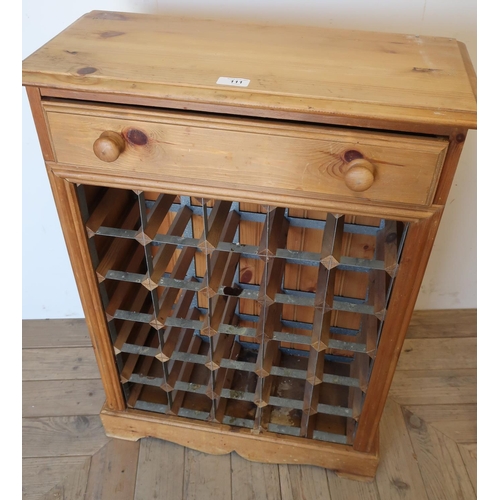 111 - Pine thirty bottle wine rack with single drawer (59cm x 84cm x 26cm)