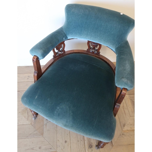 112 - Edwardian walnut framed tub chair, upholstered in blue dralon, turned supports