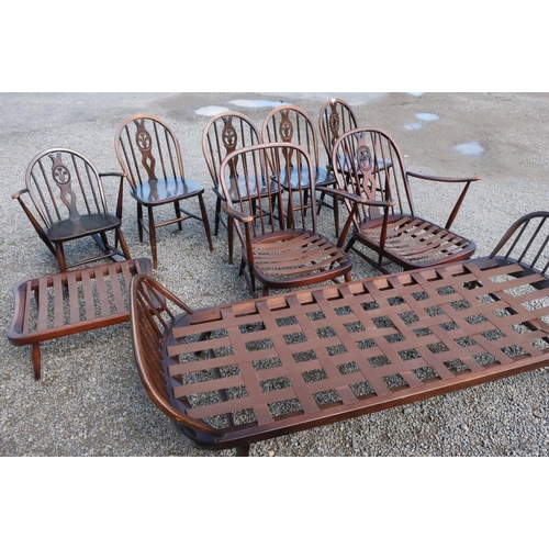 122 - Collection of Ercol dark furniture: four dining chairs with fleur de lys splat, small stool, day bed... 