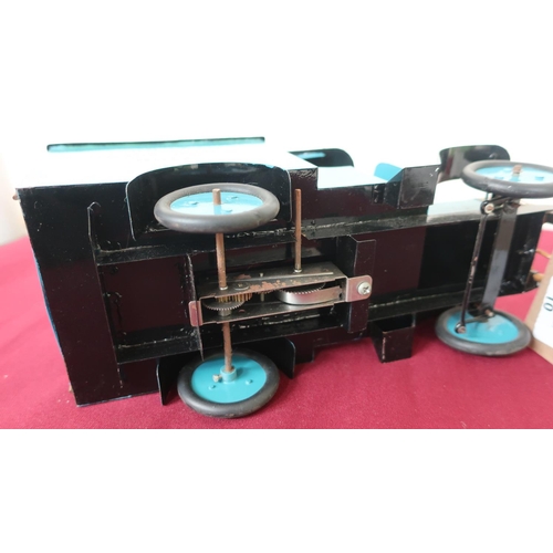 10 - Tinplate clockwork model of an early 20th century removal van, blue body with black roof, for John A... 
