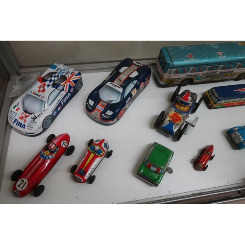 9 - Collection of friction and clock work tin plate model vehicles including GTP motorways coach, SAS Eu... 