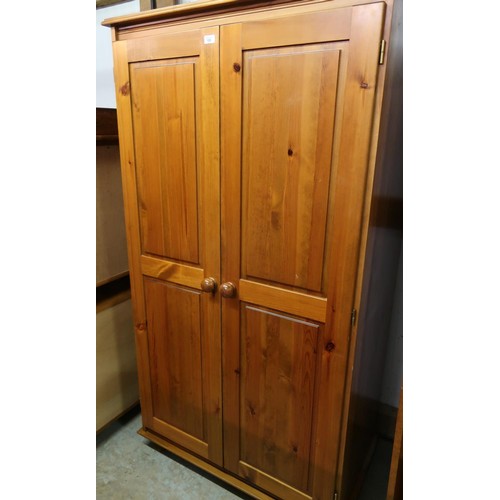 100 - The Cabinet Workshop, Warwick, pine two door wardrobe, bun feet, (185cm x 60cm)