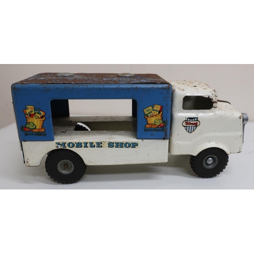 37 - Tri-ang tinplate mobile shop, with white cab and blue body (length 36cm)
